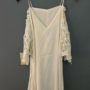 Size 12 midi dress with of the shoulder lace like sleeves.